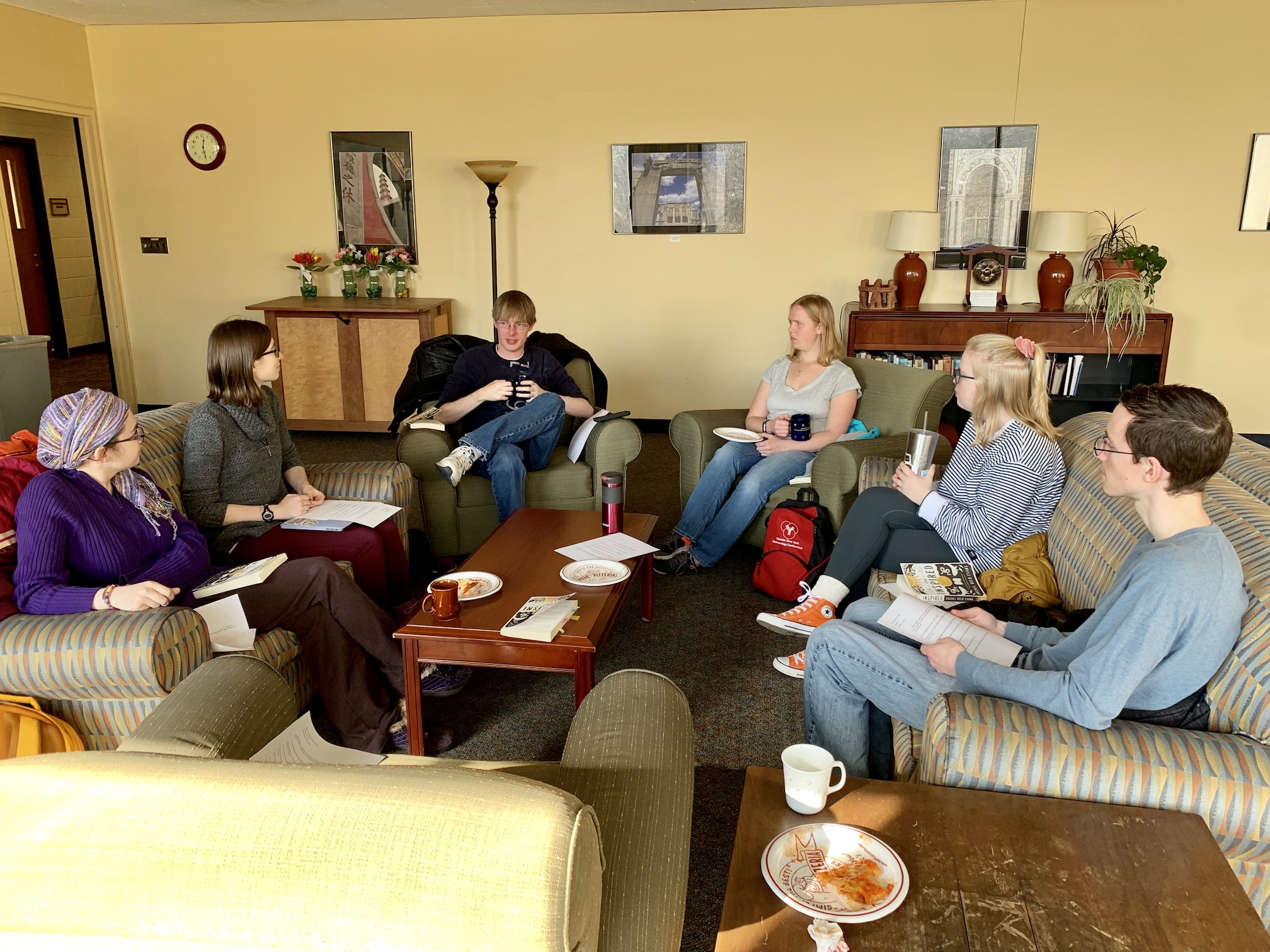 photo of students sitting and discussing